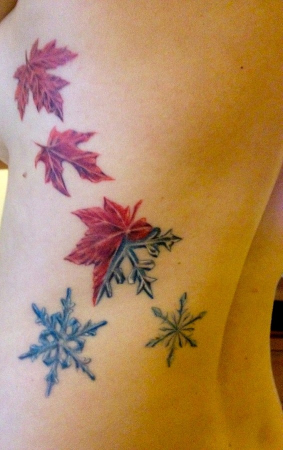autumn leaves with snowflakes tattoo