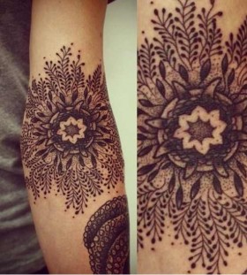 beautiful snowflake tattoo on arm