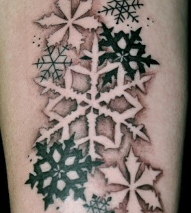 black and white snowflake tattoo