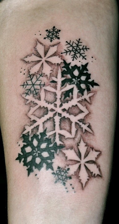 black and white snowflake tattoo