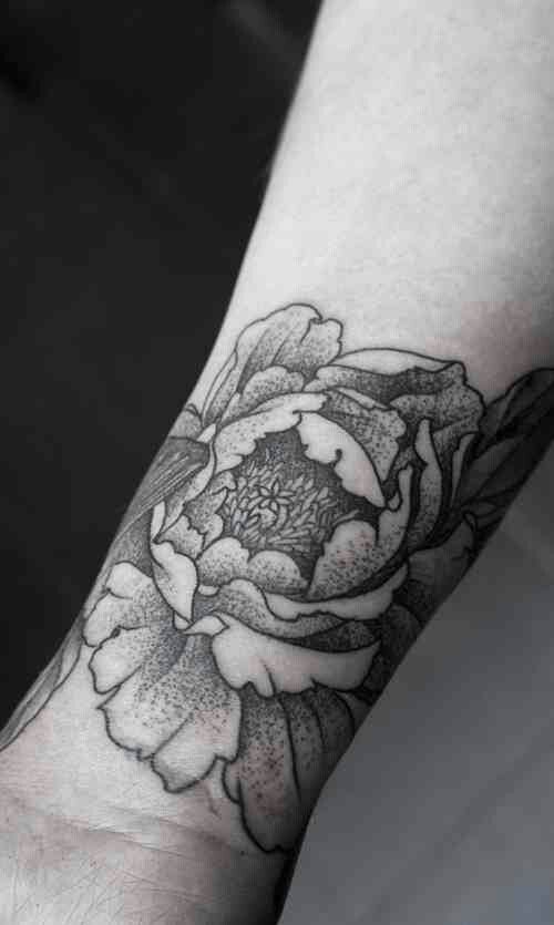 black and white wrist tattoo