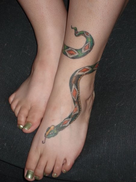 colored snake tattoo on foot