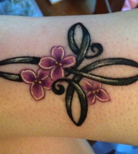 infinity cross with lilac tattoo