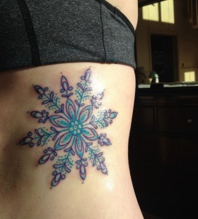 large blue snowflake tattoo