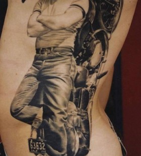 large james dean with motorbike tattoo