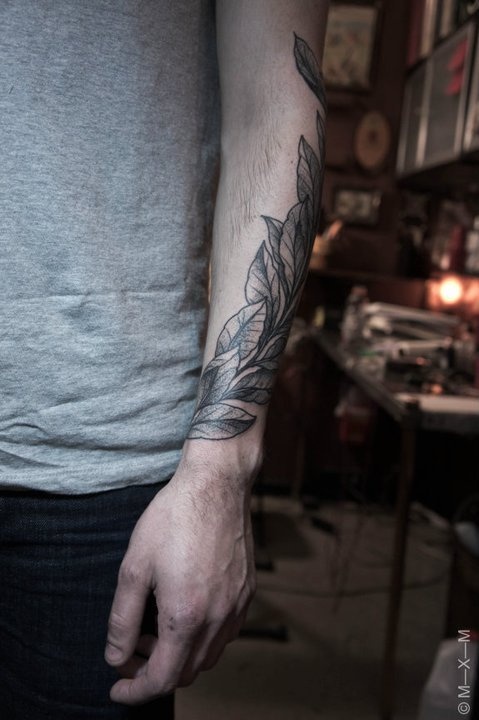 leaves tattoo on arm