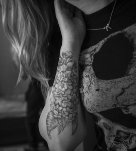 lilac tattoo on arm