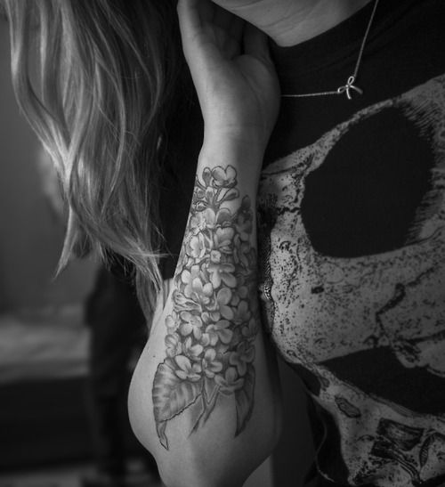 lilac tattoo on arm