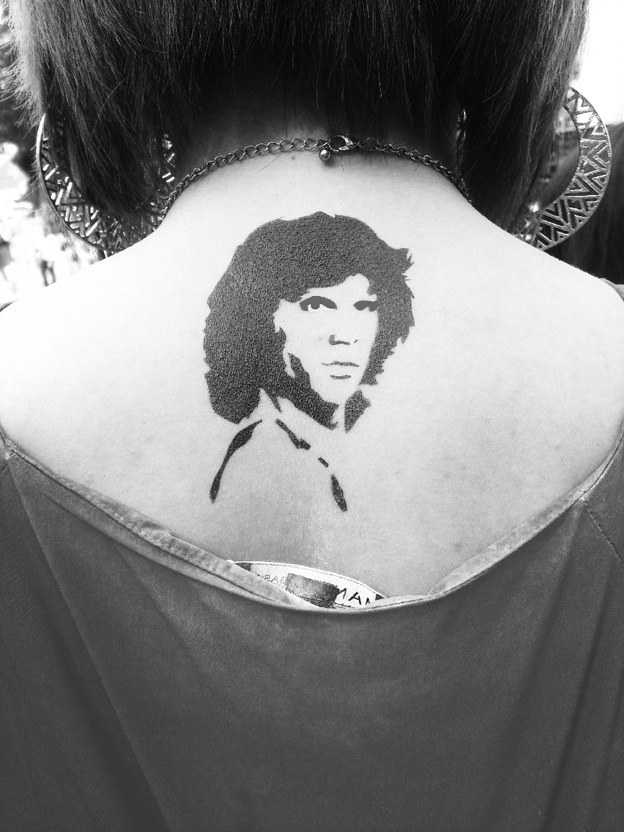 small jim morrison tattoo on the back