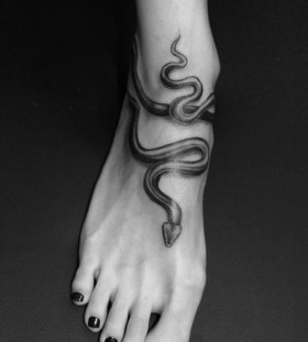 snake tattoo on foot
