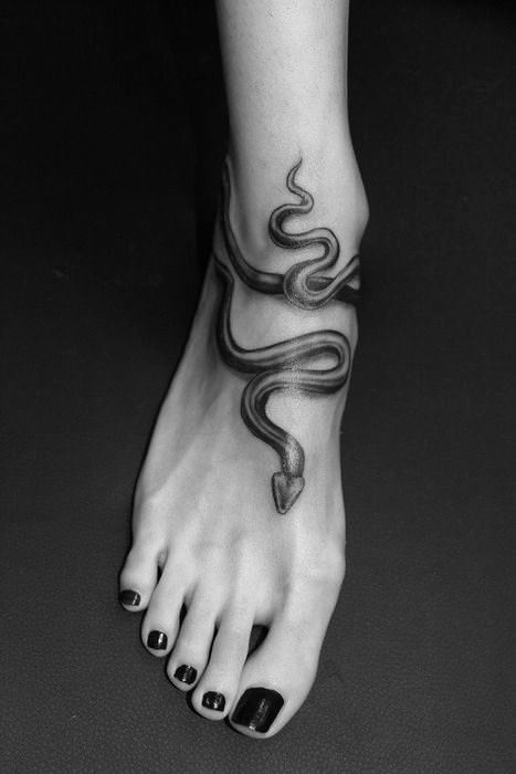 snake tattoo on foot