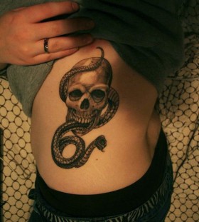snake tattoo with skull tattoo