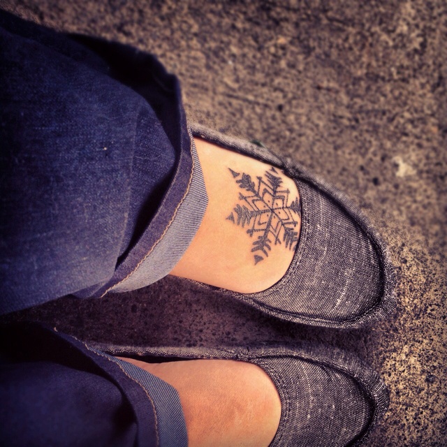 snowflake tattoo on foot
