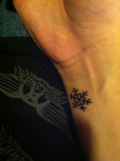 snowflake tattoo on the wrist