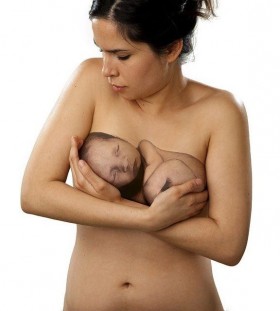 3D baby on chest tattoo