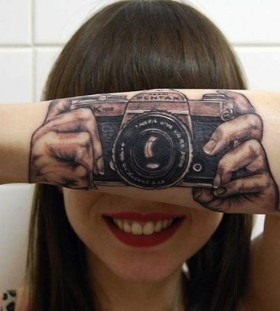 3D camera on arm tattoo