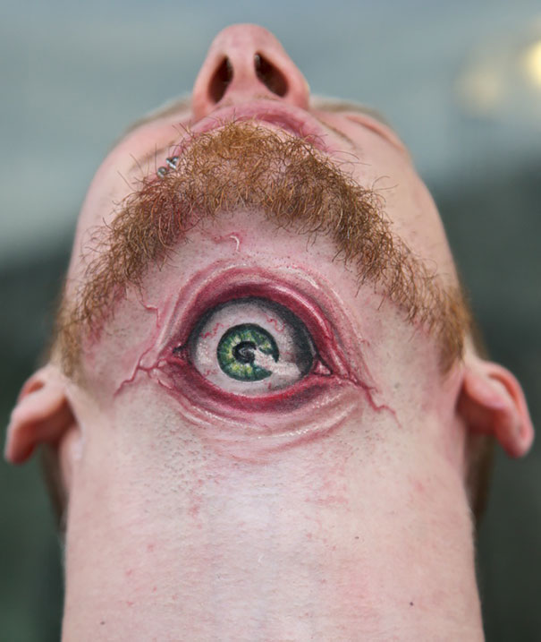 3D creepy eye under chin tattoo