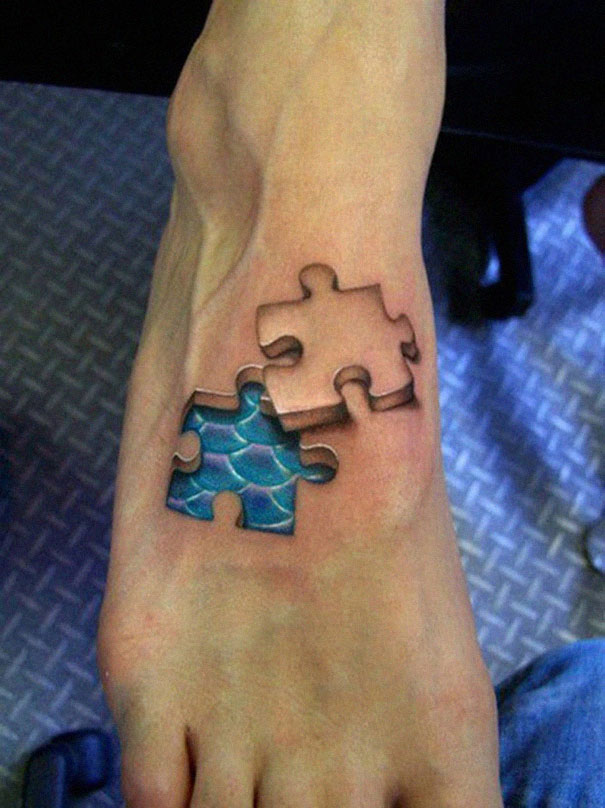 3D puzzle effect with scales on foot tattoo