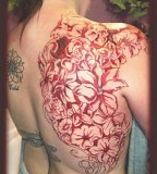 Flower Upper Back Tattoo