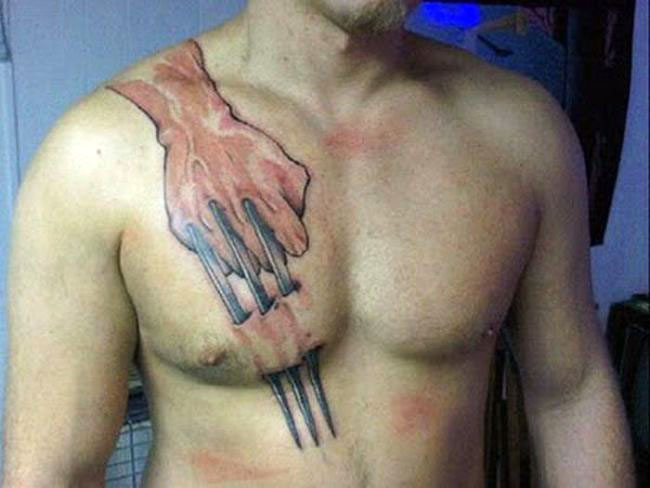 3d wolverine’s fist chest tattoo