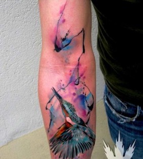 Adorable arm's watercolor tattoo