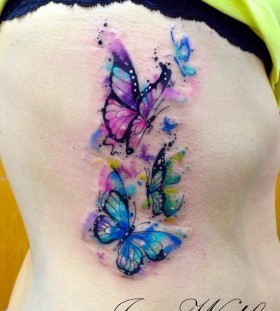 Adorable looking watercolor butterfly tattoo