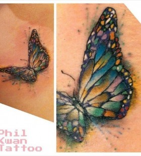 Adorable small watercolor butterfly tattoo