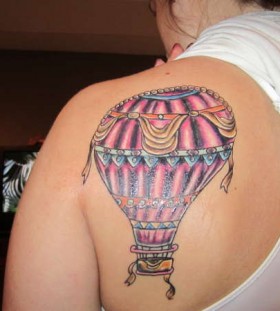 Air balloon back tattoo