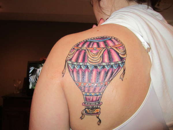 Air balloon back tattoo