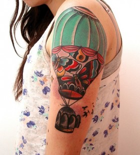 Air balloon with cage tattoo
