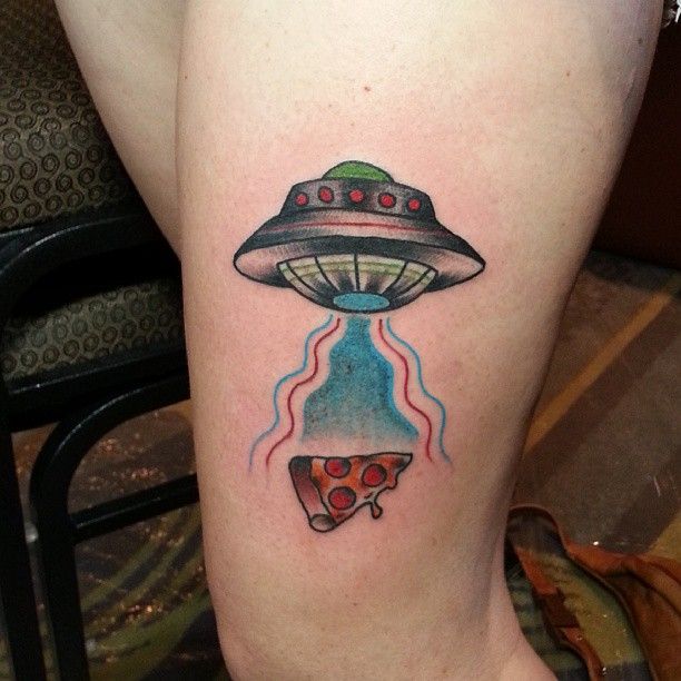 Alien plane and pizza tattoo