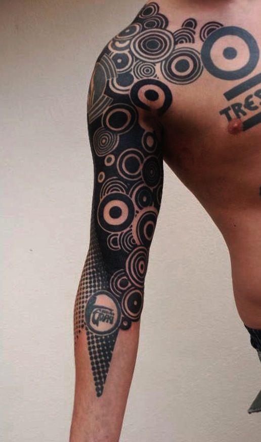 Amazing arm tattoo by Gerhard Wiesbeck