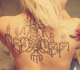 Amazing chandelier back tattoo