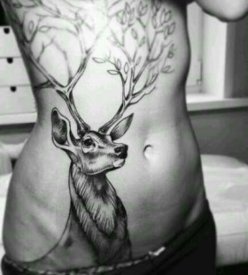 Amazing deer with branches tattoo