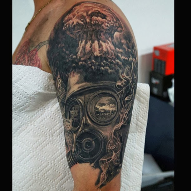 Amazing explosion and gas mask tattoo