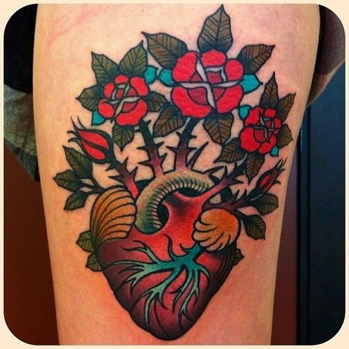 Amazing flowers tattoo by W. T. Norbert