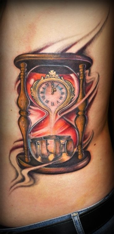Amazing looking sand clock tattoo