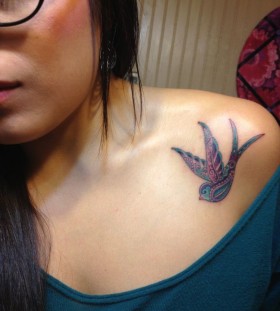 Amazing looking tribal bird tattoo