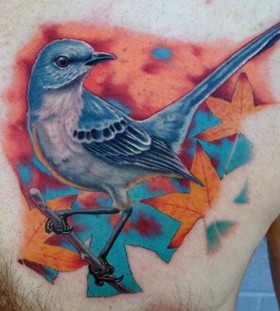 Amazing mockingbird chest tattoo