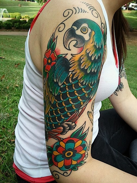 Amazing parrot arm tattoo