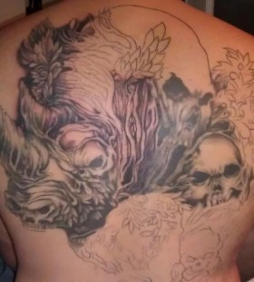 Amazing rhino and skulls back tattoo