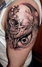 Amazing skull clock tattoo