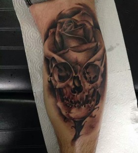 Amazing skull rose tattoo by Razvan Popescu
