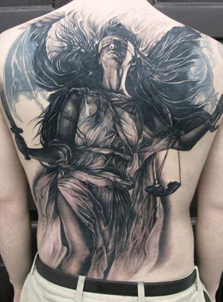 Amazing woman back tattoo by Elvin Yong