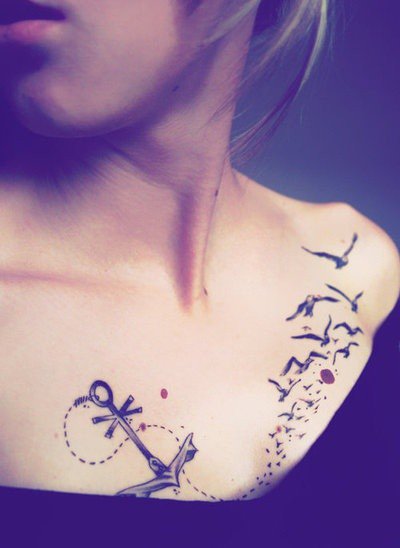 Anchor and birds tattoo