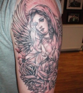 Angel and flowers tattoo by Flo Nuttall