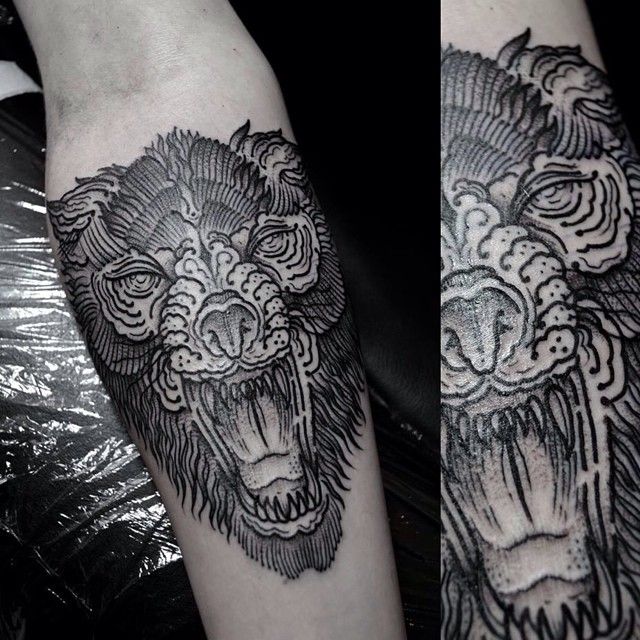 Angry animal tattoo by Thomas Cardiff