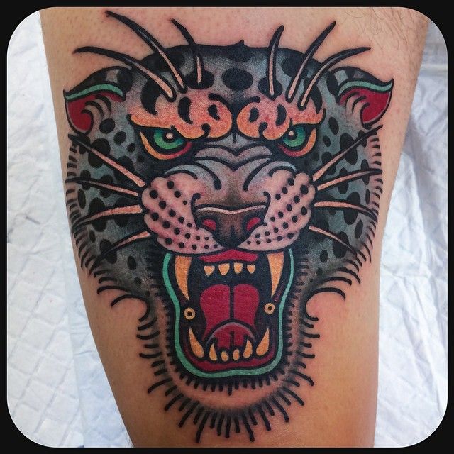 Angry animal tattoo by W. T. Norbert