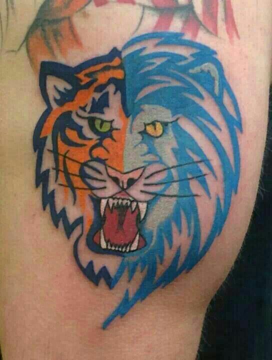 Angry lion sport tattoo