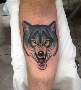 Angry wolf tattoo by Dan Molloy